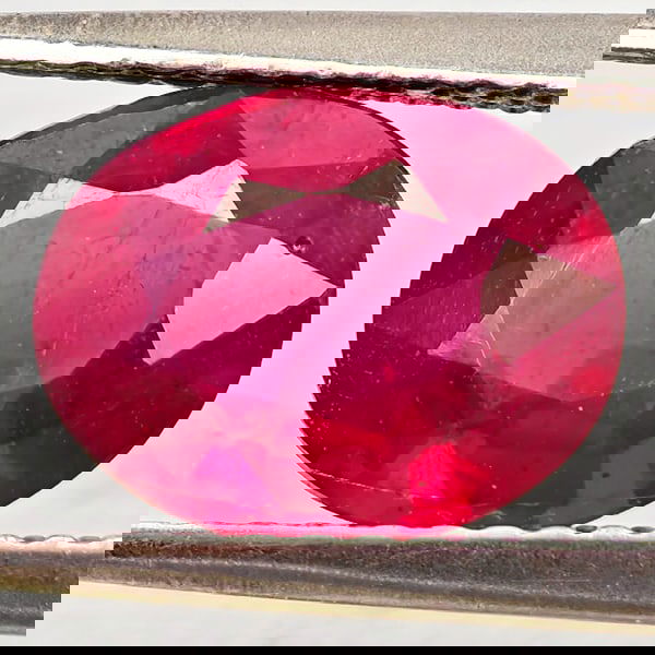 Natural Purplish Red Ruby 2.51 Ct. Oval Shape 9.2 x 7.3 Mm Gemstone from Madagascar: Product ID: 805935653 Product Name: Natural Ruby Weight: 2.51 CT. Size: 9.2 x 7.3 x 4.3 MM. Shape: Oval Color: Purplish Red Clarity:VSI Luster: Good Gems Origin: Madagascar Treatment: Heated (Lead-gla