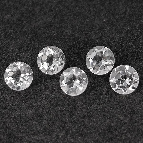 Natural White Topaz 5.02 Ct. 5 Pcs Round Shape 6.2 Mm Gemstone from Brazil: Product ID: 807168795 Product Name: Natural Topaz Weight: 5.02 CT. Size: 6.2 x 6.2 x 4 MM. Shape: Round Color: White Clarity:VSI Luster: Good Gems Origin: Brazil Treatment: Unheated Crystal Structure: