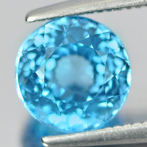 Natural Swiss Blue Topaz 2.17 Ct. Round Shape 7.2 Mm Gemstone from Brazil: Product ID: 807155286 Product Name: Natural Blue Topaz Weight: 2.17 CT. Size: 7.2 x 7.2 x 5.4 MM. Shape: Round Color: Swiss Blue Clarity:VVS Luster: Good Gems Origin: Brazil Treatment: Treated Crystal