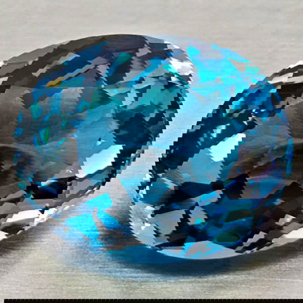 Natural London Blue Topaz 4.86 Ct. Oval Shape 11.3 x 9.2 Mm. Gemstone From Brazil: Product ID: 807168410 Product Name: Natural Blue Topaz Weight: 4.86 CT. Size: 11.3 x 9.2 x 5.9 MM. Shape: Oval Color: London Blue Clarity:VVS - VSI Luster: Very Good Gems Origin: Brazil Treatment: Tre