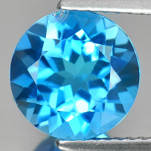 Natural Swiss Blue Topaz 3.69 Ct. Round Shape 9.3 Mm Gemstone from Brazil: Product ID: 807155891 Product Name: Natural Blue Topaz Weight: 3.69 CT. Size: 9.3 x 9.3 x 6 MM. Shape: Round Color: Swiss Blue Clarity:SI Luster: Good Gems Origin: Brazil Treatment: Treated Crystal St