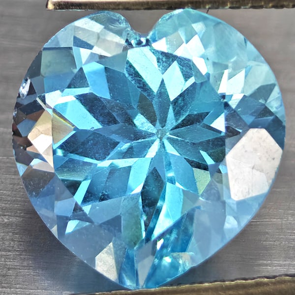 Natural Baby Blue Topaz 5.38 Ct. Heart Shape 11.1 Mm Gemstone From Brazil: Product ID: 807168737 Product Name: Natural Blue Topaz Weight: 5.38 CT. Size: 11.1 x 11.1 x 7.2 MM. Shape: Heart Shape Color: Baby Blue Clarity:VSI Luster: Good Gems Origin: Brazil Treatment: Treated