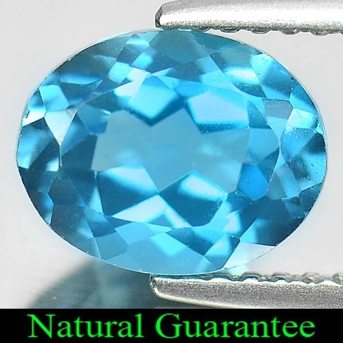 Natural London Blue Topaz 2.39 Ct. Oval Shape 8.8 x 7 Mm Gemstone From Brazil: Product ID: 807162035 Product Name: Natural Blue Topaz Weight: 2.39 CT. Size: 8.8 x 7 x 4.8 MM. Shape: Oval Color: London Blue Clarity:VVS Luster: Good Gems Origin: Brazil Treatment: Treated Crystal S