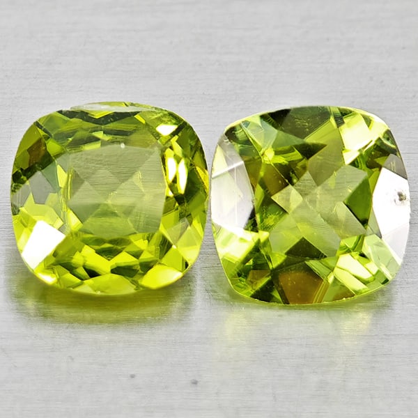 Natural Green Peridot 1.58 Ct. 2 Pcs Cushion Shape 6 Mm. Gemstones From Pakistan: Product ID: 805317421 Product Name: Natural Peridot Weight: 1.58 CT. Size: 6 x 6 x 3.3 MM. Shape: Cushion Shape Color: Green Clarity:VSI Luster: Good Gems Origin: Pakistan Treatment: Unheated Crystal
