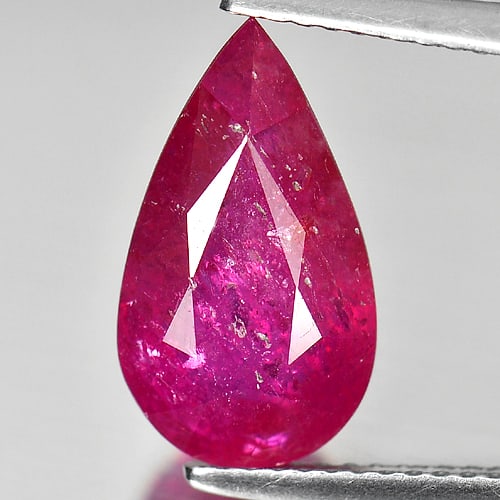 Natural Purplish Pink Ruby 4.89 Ct. Pear Shape 14.3 x 8.3 Mm. Gemstone From Mozambique: Product ID: 805917719 Product Name: Natural Ruby Weight: 4.89 CT. Size: 14.3 x 8.3 x 5.1 MM. Shape: Pear Color: Purplish Pink Clarity:SI1 Luster: Good Gems Origin: Mozambique Treatment: Heated (Lead-g