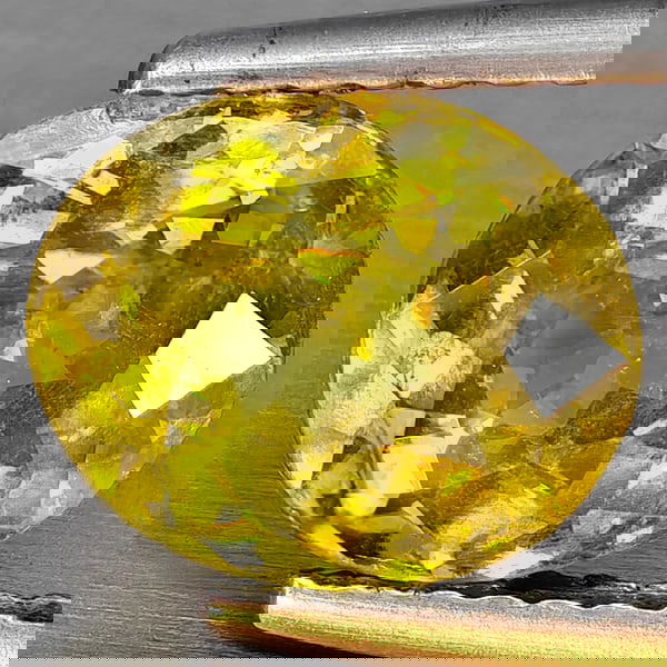 Natural Multi-Color Sphene With Rainbow Spark 1.71 Ct. Oval Shape 8.5 x 7 Mm Gemstone From (1 of 3)
