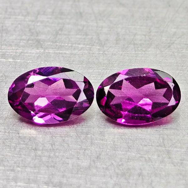 Natural Purplish Pink Rhodolite Garnet 1.00 Ct. 2 Pcs. Oval Shape 5.9 x 4 Mm Gemstones: Product ID: 802936444 Product Name: Natural Rhodolite Weight: 1.00 CT. Size: 5.9x 4 x 2.2 MM. Shape: Oval Color: Purplish Pink Clarity:VSI Luster: Good Gems Origin: Madagascar Treatment: Unheated Crys