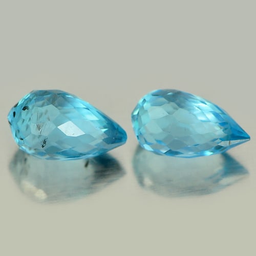 Natural Swiss Blue Topaz 1.30 Ct. 2 Pcs Briolette Shape 6.4 x 4.1 Mm Gemstone from Brazil: Product ID: 807151277 Product Name: Natural Blue Topaz Weight: 1.30 CT. Size: 6.4 x 4.1 x 4.1 MM. Shape: Briolette Color: Blue Clarity:VSI Luster: Good Gems Origin: Brazil Treatment: Treated Crystal S