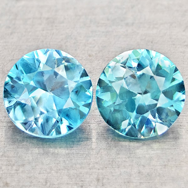 Natural Blue Zircon 1.46 Ct. 2 Pcs Round Diamond Cut 5.1 Mm Gemstones From Cambodia: Product ID: 807743047 Product Name: Natural Zircon Weight: 1.46 CT. Size: 5.1 x 5.1 x 3 MM. Shape: Round Diamond Cut Color: Blue Clarity:VSI Luster: Good Gems Origin: Cambodia Treatment: Heated Crysta