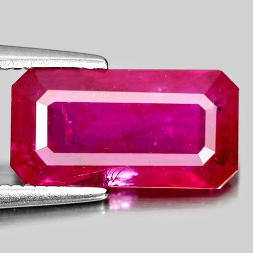 Natural Purplish Pink Ruby 3.15 Ct. Octagon Shape 11.6 x 6 Mm Gemstone From Mozambique: Product ID: 805917868 Product Name: Natural Ruby Weight: 3.15 CT. Size: 11.6 x 6 x 3.8 MM. Shape: Octagon Color: Purplish Pink Clarity:VSI Luster: Good Gems Origin: Mozambique Treatment: Heated (Lead-