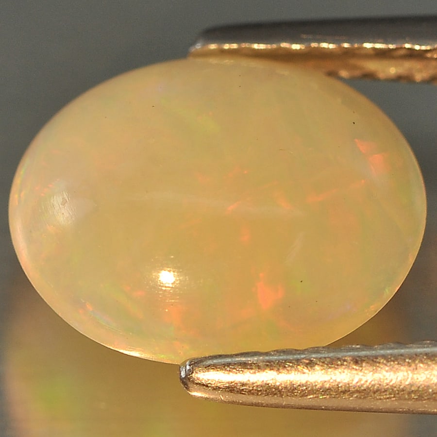 Natural Multi Color Opal 1.18 Ct. Oval Cabochon Shape 10 x 8.2 Mm Gemstone From Ethiopia (1 of 3)