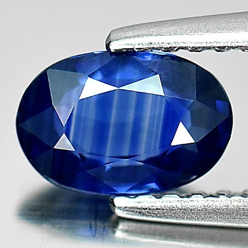 Natural Blue Sapphire 0.80 Ct. Oval Shape 7.1 x 4.7 Mm. Gemstone From Thailand: Product ID: 806011609 Product Name: Natural Blue Sapphire Weight: 0.80 CT. Size: 7.1 x 4.7 x 2.5 MM. Shape: Oval Color: Blue Clarity:VSI Luster: Good Gems Origin: Thailand Treatment: Heated Crystal St