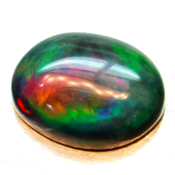Natural Multi-Color Opal 1.36 Ct. Oval Cabochon Shape 8.8 x 6.8 Mm Gemstone From Ethiopia (1 of 3)