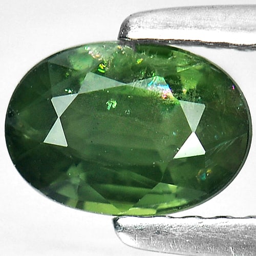 Natural Blunish Green Sapphire 1.07 Ct. Oval Shape 6.8 x 4.8 Mm Gemstone from Thailand: Product ID: 806144377 Product Name: Natural Green Sapphire Weight: 1.07 CT. Size: 6.8 x 4.8 x 3.5 MM. Shape: Oval Color: Blueish Green Clarity:SI Luster: Good Gems Origin: Thailand Treatment: Heated C