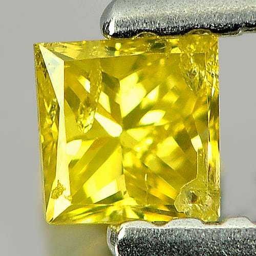 Natural Yellow Diamond 0.16 Ct. Square Princess Cut 3 Mm Gemstone from Belgium: Product ID: 802104032 Product Name: Natural Enhanced Diamond Weight: 0.16 CT. Size: 3 x 3 x 2 MM. Shape: Square Princess Cut Color: Yellow Clarity:SI1 Luster: Scintillating Gems Origin: Belgium Treatm