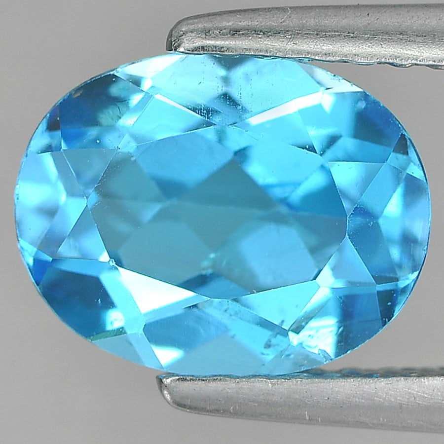 Natural Swiss Blue Topaz 2.39 Ct. Oval Shape 9.3 x 7.3 Mm. Gemstone From Brazil: Product ID: 807164137 Product Name: Natural Blue Topaz Weight: 2.39 CT. Size: 9.3 x 7.3 x 4.5 MM. Shape: Oval Color: Blue Clarity:VSI Luster: Good Gems Origin: Brazil Treatment: Treated Crystal Struct