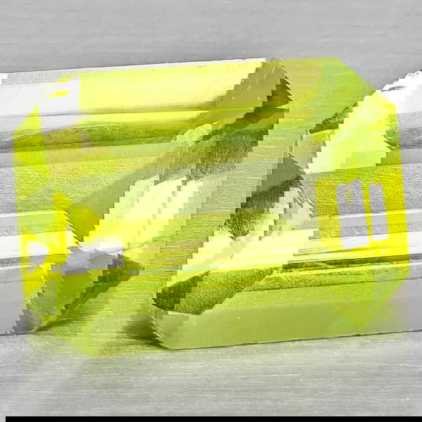 Natural Green Peridot 1.38 Ct. Octagon Shape 8.1 x 6 Mm Gemstone From Pakistan: Product ID: 805317147 Product Name: Natural Peridot Weight: 1.38 CT. Size: 8.1 x 6 x 3.5 MM. Shape: Octagon Shape Color: Green Clarity:SI1 Luster: Good Gems Origin: Pakistan Treatment: Unheated Crysta