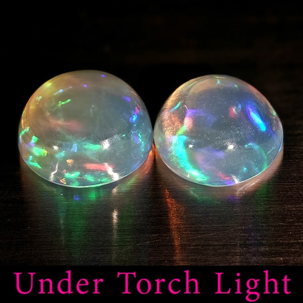 Natural Multi Color Opal 1.56 Ct. 2 Pcs Round Cabochon Shape 7 Mm Gemstones From Ethiopia: Product ID: 818728211 Product Name: Natural Opal Weight: 1.56 CT. Size: 7 x 7 x 3.7 MM. Shape: Round Cabochon Color: Multi-Color Clarity:Semi - Transparent Luster: Good Gems Origin: Ethiopia Treatment