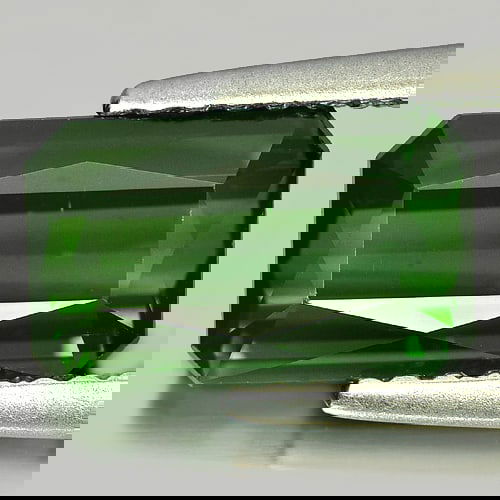 Natural Green Tourmaline 2.17 Ct. VVS Octagon Shape 9.5 x 5.8 Mm Gemstone From Nigeria: Product ID: 807221102 Product Name: Natural Tourmaline Weight: 2.17 CT. Size: 9.5 x 5.8 x 4.3 MM. Shape: Octagon Color: Green Clarity:VVS Luster: Good Gems Origin: Nigeria Treatment: Unheated Crystal