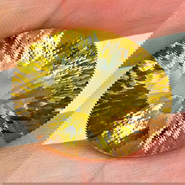 Natural Yellow Lemon Quartz 13.18 Ct. Clean Oval Concave Cut 18.1 x 14.5 Mm Gemstone From Brazil: Product ID: 805529951 Product Name: Natural Quartz Weight: 13.18 CT. Size: 18.1 x 14.5 x 9.4 MM. Shape: Oval Concave Cut Color: Yellow Lemon Clarity:IF Luster: Good Gems Origin: Brazil Treatment: Unhe