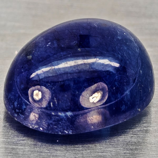 Natural Blue Sapphire 12.09 Ct. Oval Cabochon Shape 13.5 x 11.2 Mm Gemstone from Madagascar: Product ID: 806012366 Product Name: Natural Blue Sapphire Weight: 12.09 CT. Size: 13.5 x 11.2 x 7.6 MM. Shape: Oval Cabochon Color: Blue Clarity:Semi - Transparent Luster: Good Gems Origin: Madagascar