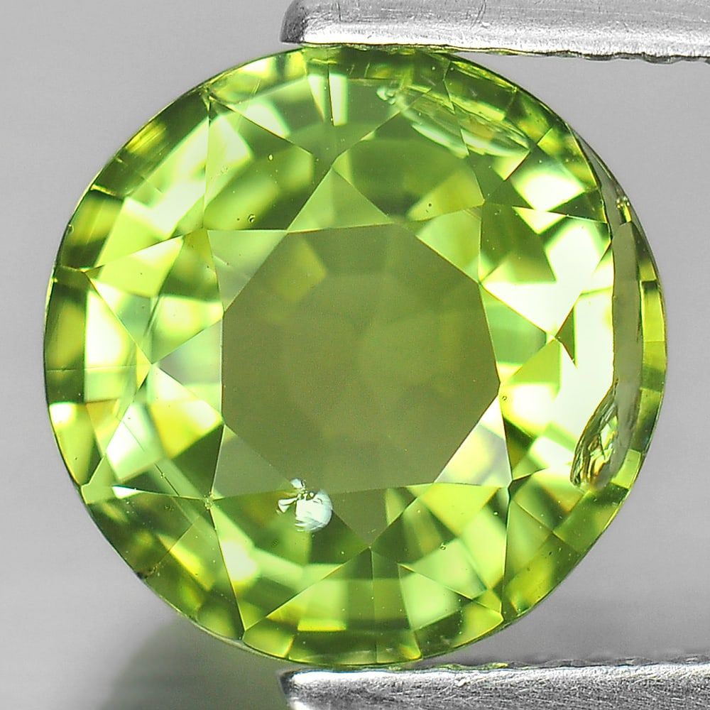 Natural Green Tourmaline 2.21 Ct. Round Shape 8.5 Mm. Unheated Gemstone from Nigeria: Product ID: 107208152 Product Name: Natural Tourmaline Weight: 2.21 CT. Size: 8.5 x 8.5 x 4.8 MM. Shape: Round Color: Green Clarity:Si Luster: Good Gems Origin: Nigeria Treatment: Unheated Crystal Str