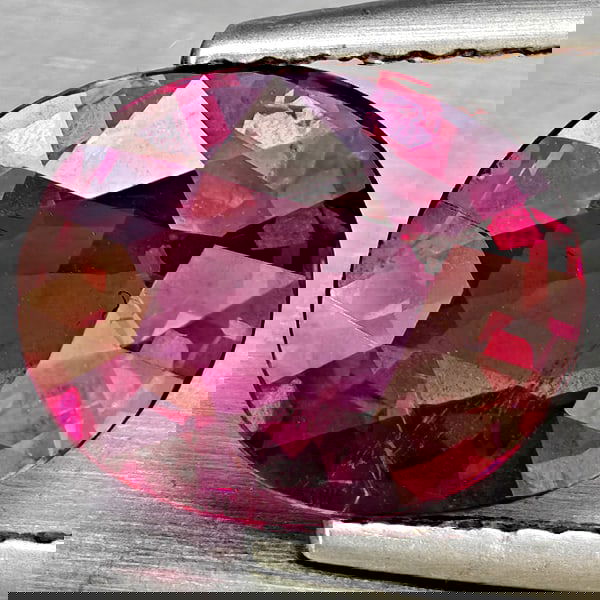 Natural Purplish Pink Rhodolite Garnet 2.93 Ct. Oval Shape 10.4 x 8.5 Mm Gemstone From Madagascar: Product ID: 802937787 Product Name: Natural Rhodolite Weight: 2.93 CT. Size: 10.4 x 8.5 x 4.3 MM. Shape: Oval Shape Color: Purplish Red Clarity:SI1 Luster: Good Gems Origin: Madagascar Treatment: Unhe