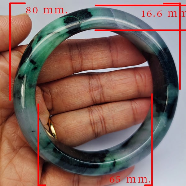Natural Genuine Mulit Color Jade 525.00 Ct. Bangle Round Shape 80 x 65 Mm Gemstone From Thailand: Product ID: 819816133 Product Name: Natural Gemstones Weight: 525.00 CT. Size: 80 x 65 x 16.6 MM. Shape: Round Shape Color: Multi-Color Green Clarity:Opaque Luster: Good Gems Origin: Thailand Treatmen