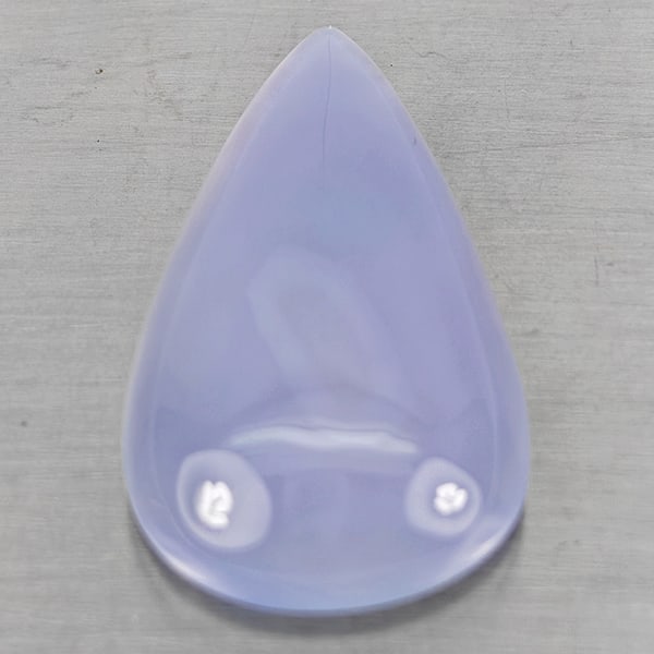 Natural Lavender Chalcedony 35.93 Ct. Pear Cabochon Shape 34 x 19.7 Mm Gemstone From Russia: Product ID: 801502660 Product Name: Natural Chalcedony Weight: 35.93 CT. Size: 34 x 19.7 x 8.6 MM. Shape: Pear Cabochon Color: Lavender Clarity:Semi - Transparent Luster: Good Gems Origin: Russia Trea