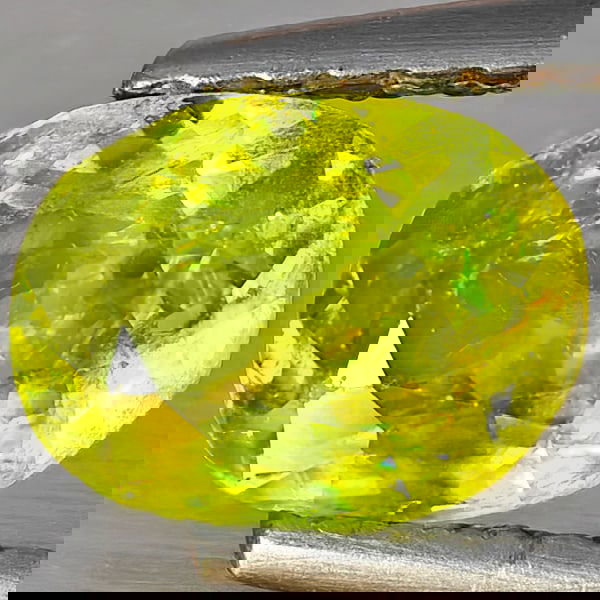 Natural Multi-Color With Rainbow Spark Sphene 1.07 Ct. Oval Shape 7.2 x 5.3 Mm Gemstone From: Product ID: 806509198 Product Name: Natural Sphene Weight: 1.07 CT. Size: 7.2 x 5.3 x 3.8 MM. Shape: Oval Shape Color: Multi-Color Clarity:SI1 Luster: Good Gems Origin: Madagascar Treatment: Unheated