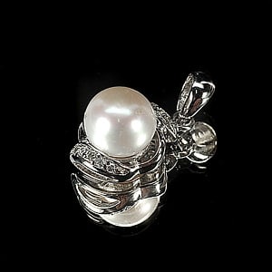 2.30 G. Attractive Natural White Pearl Jewelry Sterling Silver Pendent: Product ID: 207100545 Product Type: 925 Sterling Silver Fine Jewelry Jewelry Weight: 2.30 Grams. Gemstones Color: White Metal: Solid Silver 92.5%. Gemstone Detail: Center: Round Cabochon Natural White