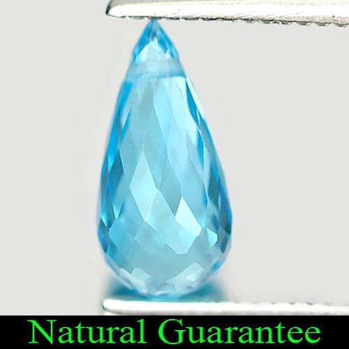 Natural Swiss Blue Topaz 1.37 Ct. Briolette with Drilled Cut 9.1 x 4.6 Mm Gemstone from Brazil: Product ID: 807164505 Product Name: Natural Blue Topaz Weight: 1.37 CT. Size: 9.1 x 4.6 x 4.6 MM. Shape: Briolette with Drilled Color: Blue Clarity:VSI Luster: Good Gems Origin: Brazil Treatment: Trea