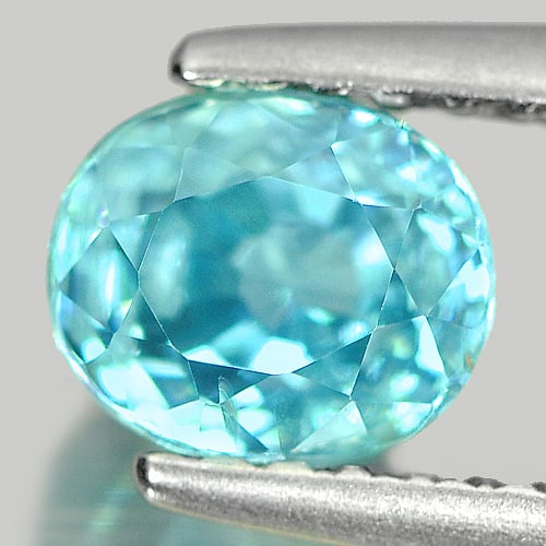 Natural Blue Zircon 1.31 Ct. Oval Shape 5.9 x 5 Mm. Gemstone From Cambodia: Product ID: 807709619 Product Name: Natural Zircon Weight: 1.31 CT. Size: 5.9 x 5 x 4.3 MM. Shape: Oval Color: Blue Clarity:SI Luster: Good Gems Origin: Cambodia Treatment: Heated Crystal Structure: T