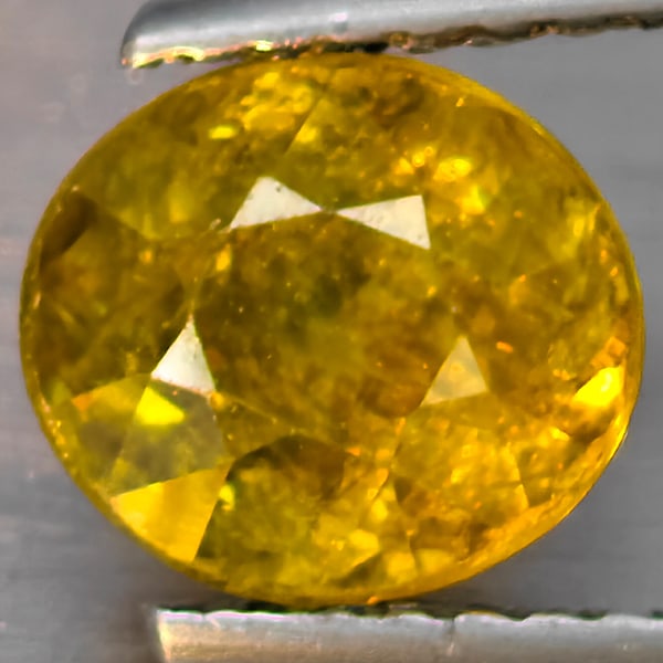 Natural Multi-Color With Rainbow Spark Sphene 1.88 Ct. Oval Shape 7.4 x 6.6 Mm Gemstone From: Product ID: 806509089 Product Name: Natural Sphene Weight: 1.88 CT. Size: 7.4 x 6.6 x 5.3 MM. Shape: Oval Shape Color: Multi-Color Clarity:SI1 Luster: Good Gems Origin: Madagascar Treatment: Unheated