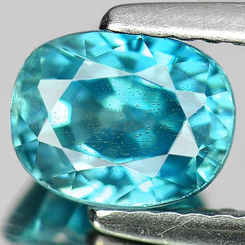 Natural Blue Zircon 1.97 Ct. Oval Shape 7 x 5.5 Mm Gemstone from Cambodia: Product ID: 807726969 Product Name: Natural Zircon Weight: 1.97 CT. Size: 7 x 5.5 x 4.6 MM. Shape: Oval Color: Blue Clarity:SI Luster: Good Gems Origin: Cambodia Treatment: Heated Crystal Structure: T