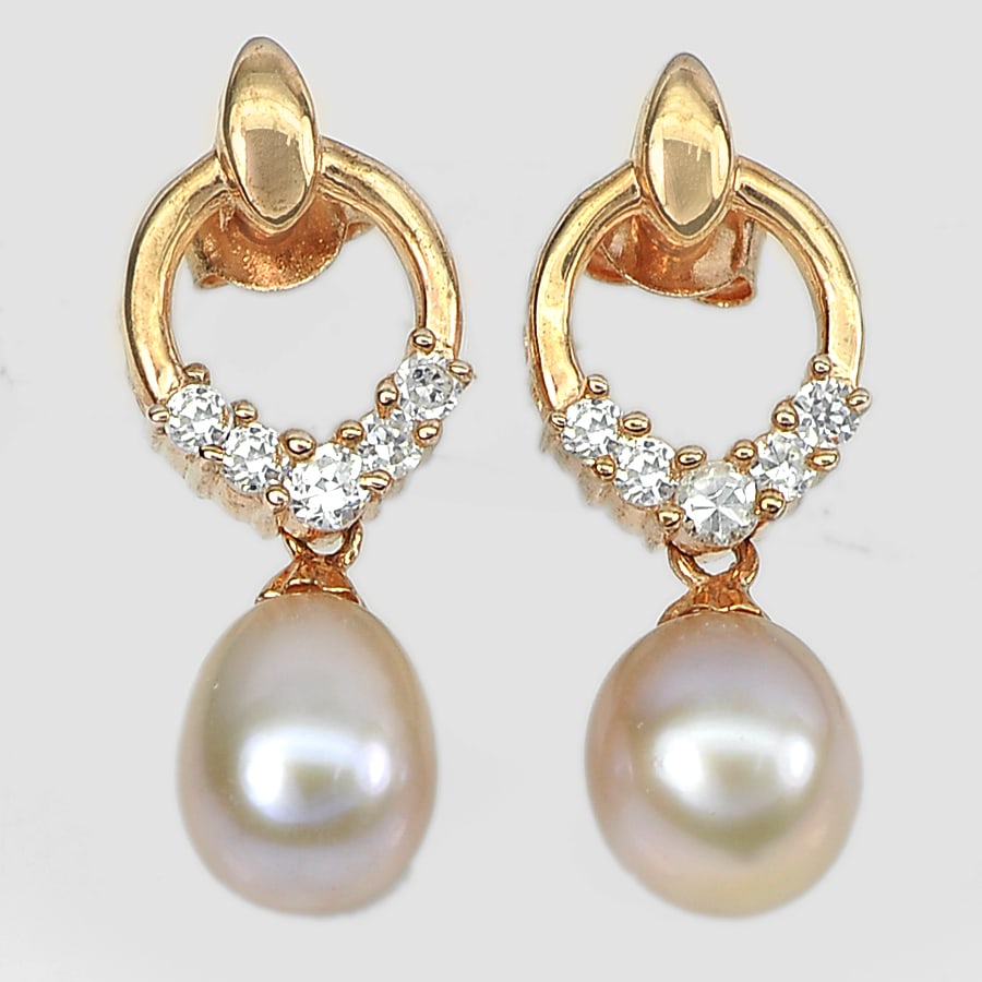 4.42 G. Natural Pink Pearl with CZ Real 925 Sterling Silver Rose Gold Earrings: Product ID: 207100562 Product Type: 925 Sterling Silver Fine Jewelry Jewelry Weight: 4.42 Grams. Gemstones Color: Pink Metal: Solid Silver 92.5%. Gemstone Detail: Center: Oval Cabochon Natural Pink Pe