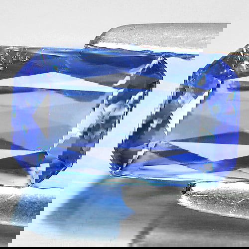 Certified Natural Violetish Blue Tanzanite 1.09 Ct. Octagon Shape 7.84 x 4.69 Mm. Gemstone from: Product ID: 807005312 Product Name: Natural Tanzanite Weight: 1.09 CT. Size: 7.84 x 4.69 x 3.01 MM. Shape: Octagon Color: Blue Clarity:VSI Luster: Good Gems Origin: Tanzania Treatment: Heated Crystal