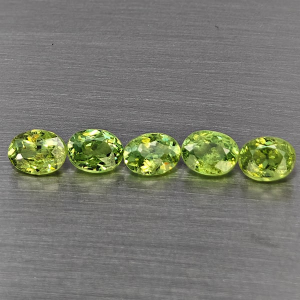 Natural Green Demantiod Garnet 1.16 Ct. 5 Pcs Oval Shape 4.2 x 3.2 Mm Gemstones From Madagascar: Product ID: 802937518 Product Name: Natural Demantoid Weight: 1.16 CT. Size: 4.2 x 3.2 x 2.2 MM. Shape: Oval Color: Green Clarity:SI1 Luster: Good Gems Origin: Madagascar Treatment: Unheated Crystal S