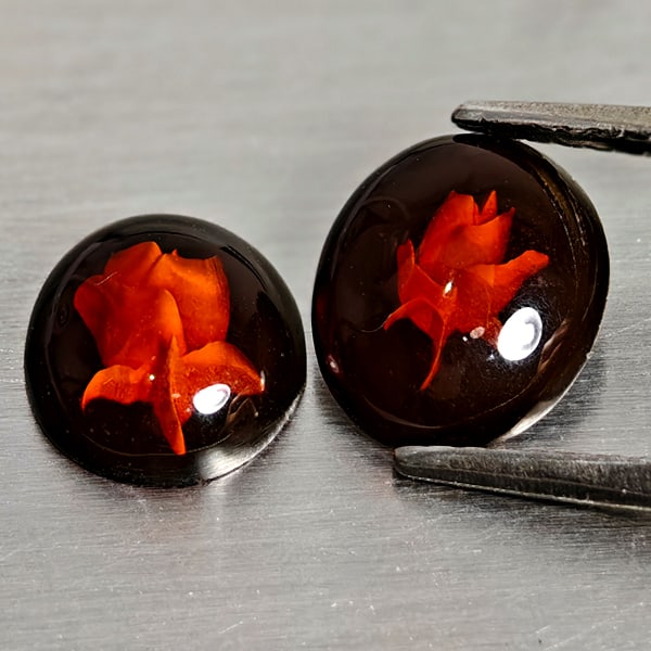 Natural Amber 0.98 Ct. 2 Pcs Flower Carving In Oval Cabochon Shape 9.1 x 7.7 Mm Gemstones From: Product ID: 819091076 Product Name: Natural Amber Weight: 0.98 CT. Size: 9.1 x 7.7 x 2.2 MM. Shape: Oval Cabochon Color: Brown Yellow Clarity:Semi - Transparent Luster: Good Gems Origin: Poland Treatm