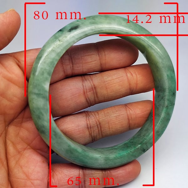 Natural Genuine Mulit Color Jade 418.69 Ct. Bangle Round Shape 80 x 65 Mm Gemstone From Thailand: Product ID: 819816125 Product Name: Natural Gemstones Weight: 418.69 CT. Size: 80 x 65 x 14.2 MM. Shape: Round Shape Color: Multi-Color Green Clarity:Opaque Luster: Good Gems Origin: Thailand Treatmen