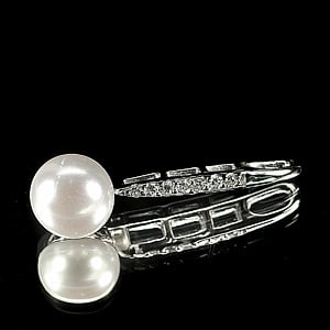 1.94 G. Natural White Pearl with CZ Real 925 Sterling Silver Jewelry Pendant: Product ID: 207100878 Product Type: 925 Sterling Silver Fine Jewelry Jewelry Weight: 1.94 Grams. Gemstones Color: White Metal: Solid Silver 92.5%. Gemstone Detail: Center: Round Cabochon Natural White