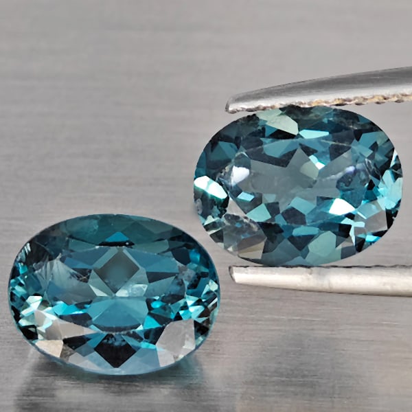 Natural London Blue Topaz 4.43 Ct. 2 Pcs Oval Shape 9.3 x 7.2 Mm Gemstones From Brazil: Product ID: 807168895 Product Name: Natural Blue Topaz Weight: 4.43 CT. Size: 9.3 x 7.2 x 4.5 MM. Shape: Oval Color: London Blue Clarity:SI1 Luster: Good Gems Origin: Brazil Treatment: Treated Crystal