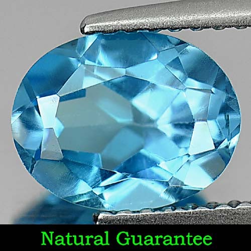 Natural Swiss Blue Topaz 1.97 Ct. VVS Oval Shape 8.9 x 7 Mm. Gemstone From Brazil: Product ID: 807164117 Product Name: Natural Blue Topaz Weight: 1.97 CT. Size: 8.9 x 7 x 4.3 MM. Shape: Oval Color: Swiss Blue Clarity:VVS Luster: Good Gems Origin: Brazil Treatment: Treated Crystal St