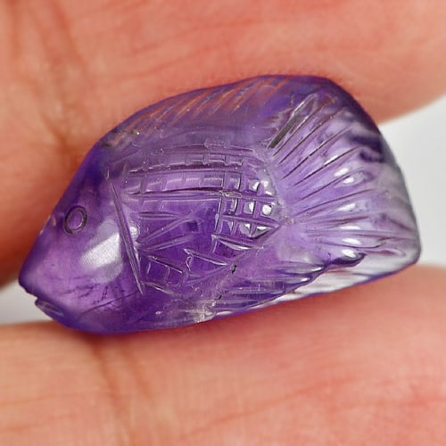 Natural Violet Amethyst 9.77 Ct. Fish Carving Size 20.5 x 11.5 Mm. Unheated Gemstone From Brazil: Product ID: 810303434 Product Name: Natural Amethyst Weight: 9.77 CT. Size: 20.5 x 11.5 x 6.9 MM. Shape: Fish Carving Color: Violet Clarity:Semi - Transparent Luster: Good Gems Origin: Brazil Treatmen
