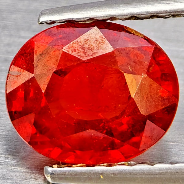 Natural Orangish Red Spessartine Garnet 1.32 Ct. Oval Shape 7.1 x 6 Mm Gemstones From Namibia: Product ID: 802937193 Product Name: Natural Garnet Weight: 1.32 CT. Size: 7.1 x 6 x 3.5 MM. Shape: Oval Shape Color: Orangish Red Clarity:SI1 Luster: Good Gems Origin: Namibia Treatment: Unheated Crys