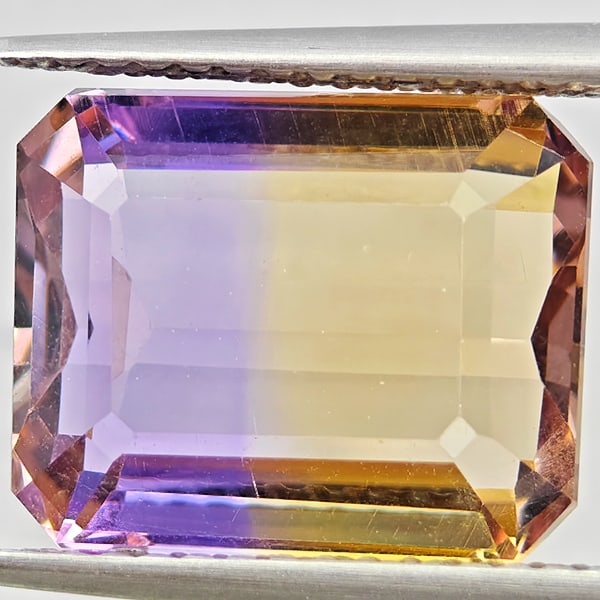 Natural Bi Color Ametrine 3.64 Ct. Octagon Shape 11 x 8.5 Mm Gemstone from Bolivia: Product ID: 800408591 Product Name: Natural Ametrine Weight: 3.64 CT. Size: 11 x 8.5 x 6.3 MM. Shape: Octagon Color: Bi Color Clarity:VSI Luster: Good Gems Origin: Bolivia Treatment: Unheated Crystal