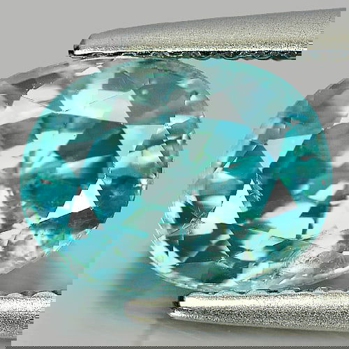 Natural Blue Zircon 2.63 Ct. Oval Shape 8.7 x 6.8 Mm Gemstone From Cambodia: Product ID: 807720764 Product Name: Natural Zircon Weight: 2.63 CT. Size: 8.7 x 6.8 x 4.6 MM. Shape: Oval Color: Blue Clarity:SI Luster: Good Gems Origin: Cambodia Treatment: Heated Crystal Structure: