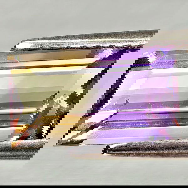 Natural Bi Color Ametrine 1.86 Ct. Baguette Shape 10.1 x 5.8 Mm. Gemstone From Bolivia: Product ID: 800408216 Product Name: Natural Ametrine Weight: 1.86 CT. Size: 10.1 x 5.8 x 4.2 MM. Shape: Baguette Color: Bi Color Clarity:VSI Luster: Very Good Gems Origin: Bolivia Treatment: Unheated