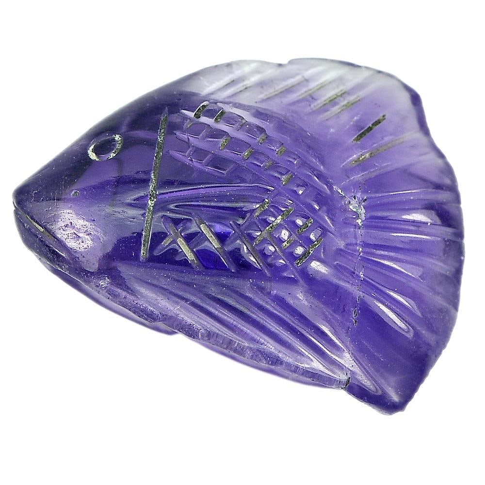 Natural Purple Amethyst 9.00 Ct. Fish Carving Shape 18.7 x 13.2 Mm Gemstone from Brazil: Product ID: 810303499 Product Name: Natural Amethyst Weight: 9.00 CT. Size: 18.7 x 13.2 x 7.3 MM. Shape: Fish Carving Color: Purple Clarity:Semi - Transparent Luster: Good Gems Origin: Brazil Treatmen