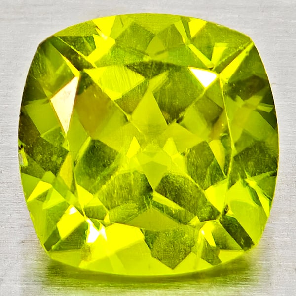 Natural Green Peridot 1.63 Ct. Cushion Shape 7.1 Mm Gemstone From Pakistan: Product ID: 805317261 Product Name: Natural Peridot Weight: 1.63 CT. Size: 7.1 x 7.1 x 4.4 MM. Shape: Cushion Shape Color: Green Clarity:VSI - SI1 Luster: Good Gems Origin: Pakistan Treatment: Unheate